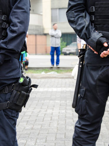 Leg of a policeman in which a firearm is found, concept of security